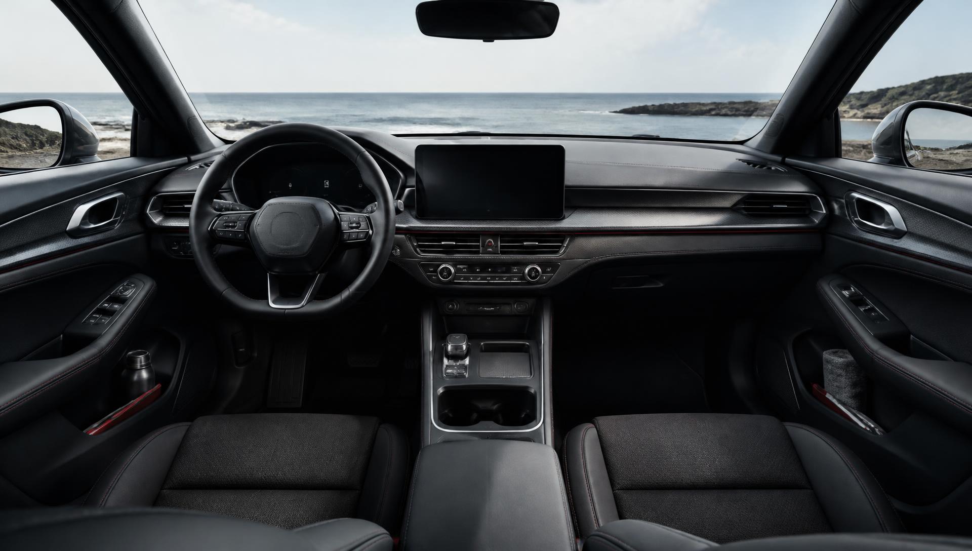 Organized modern vehicle interior facing a coastal landscape